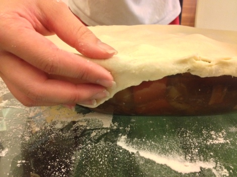 completely cover the dish with the puff pastry